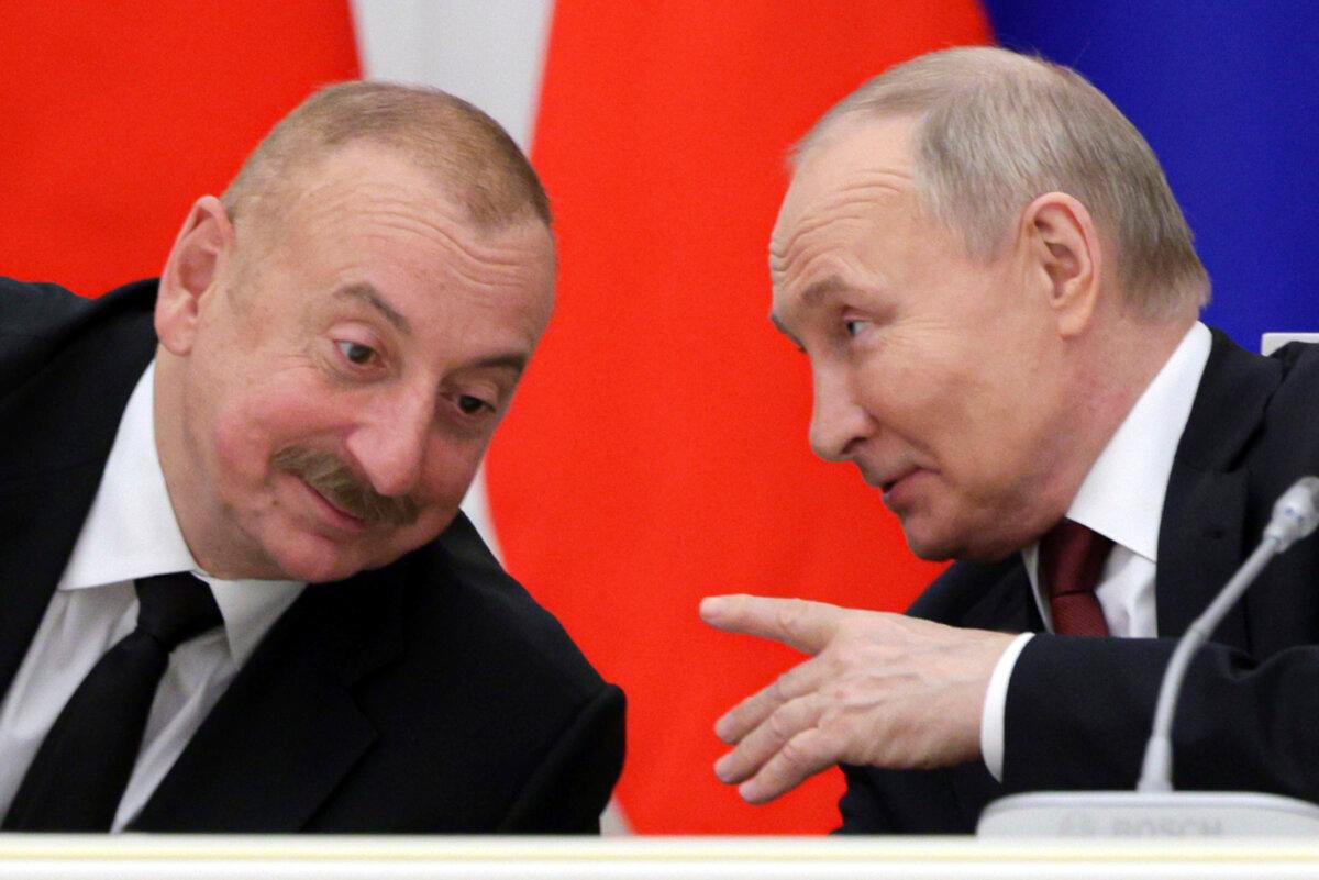Russian President Vladimir Putin (R) and Azerbaijani President Ilham Aliyev meet in Moscow on April 22, 2024. (Gavriil Grigorov, Sputnik, Kremlin Pool Photo via AP)