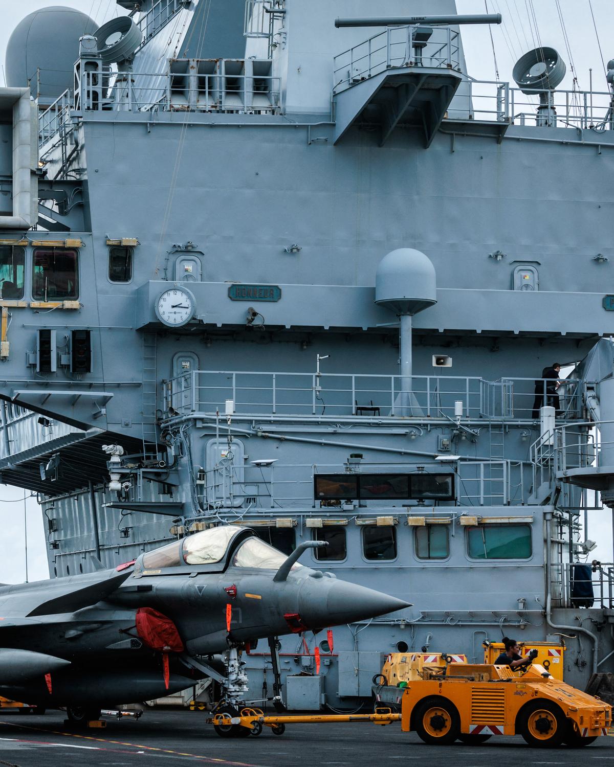 Day in Photos: French Aircraft Carrier in Indonesia, Fighting in DR Congo, and Viking Parade