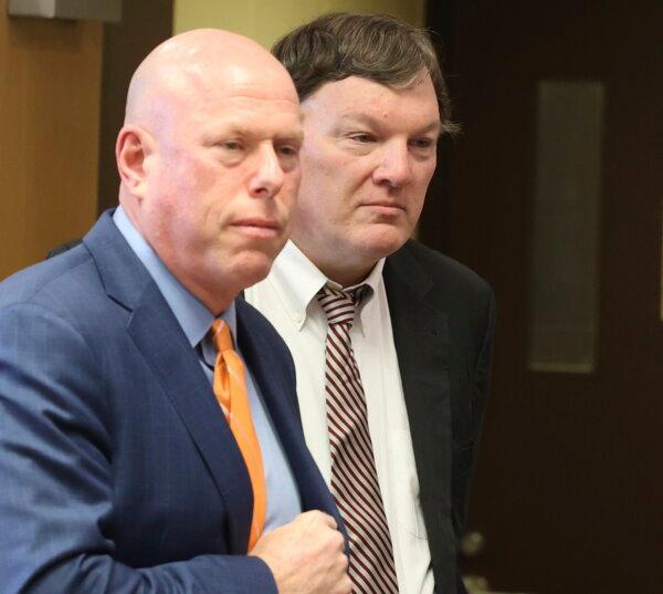 Rex Heuermann stands inside Judge Tim Mazzei's courtroom with his attorney Michael Brown at Suffolk County Court in Riverhead, New York on Jan. 29, 2025. (James Carbone /Newsday via AP)