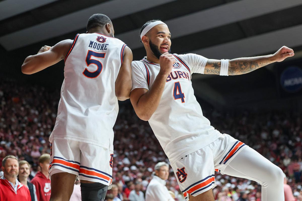 Johni Broome Scores 19 Points as No. 1 Auburn Holds Off In-state Rival and No. 2 Alabama 94–85