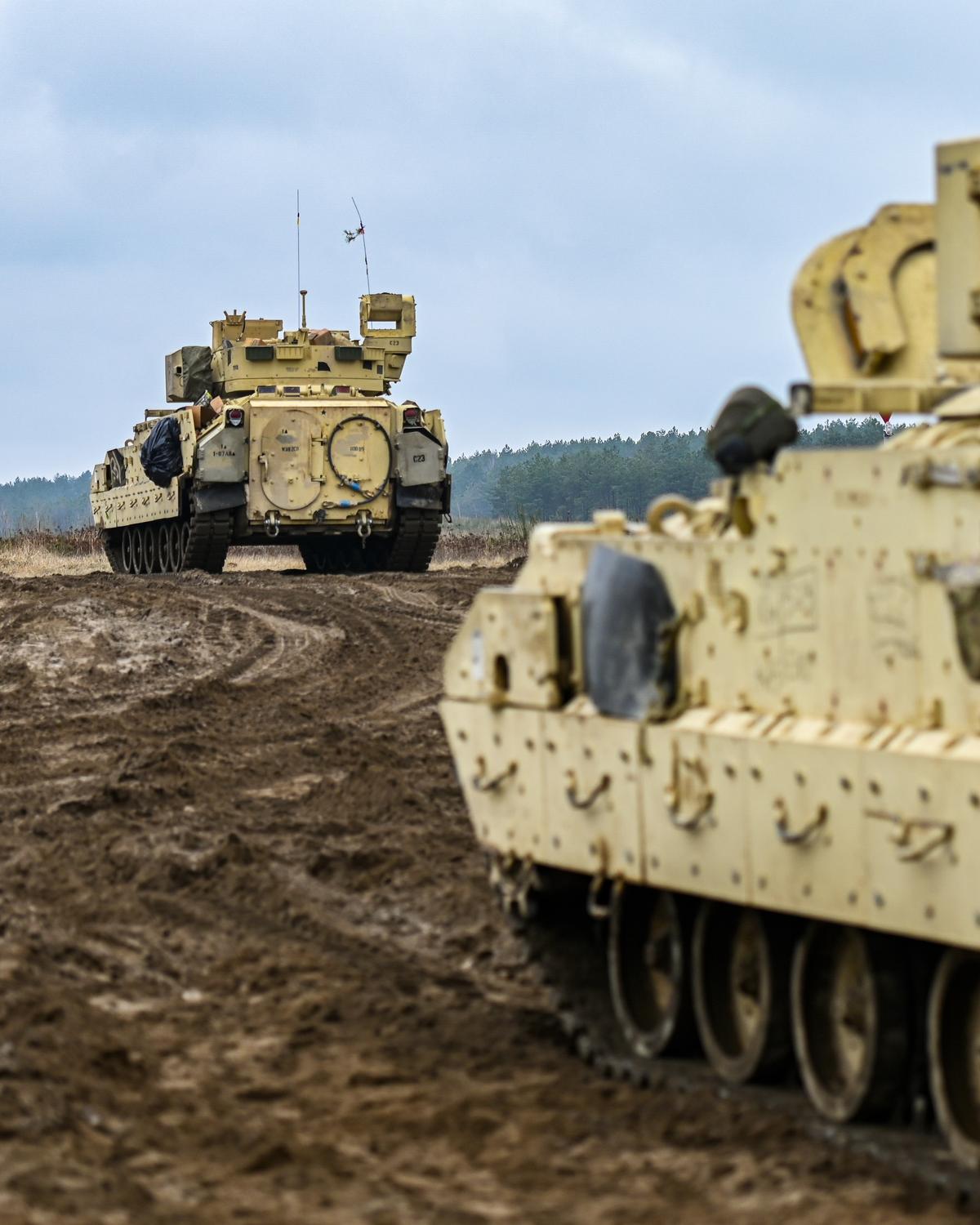 Day in Photos: Military Exercises in Poland, Explosion in Ecuador, and Anniversary of Millennium Wheel