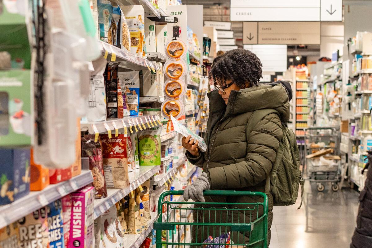 People shop at a grocery store in New York City on March 12, 2025. (Samira Bouaou/The Epoch Times)