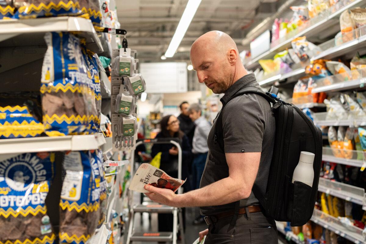 People shop at a grocery store in New York City, on March 12, 2025. (Samira Bouaou/The Epoch Times)