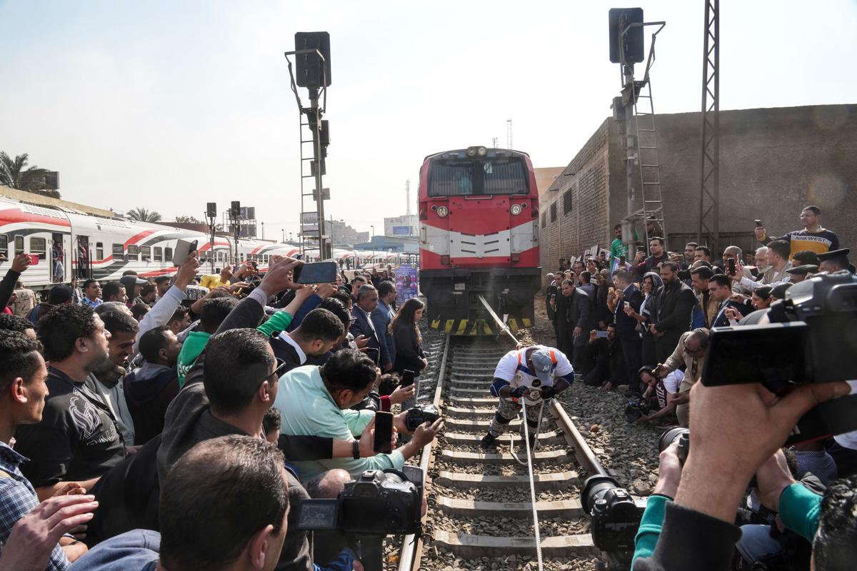 He Can Pull Train by Strength of His Teeth—Egyptian Wrestler Sets 3 World Records