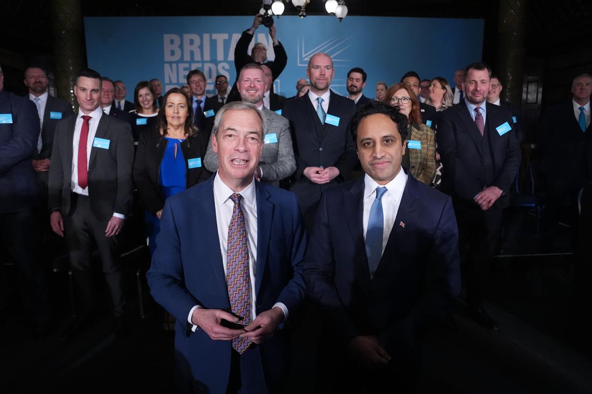 Reform UK leader, Nigel Farage (front L) with the party’s Home Affairs spokesman Zia Yusuf (front R) during a press conference on March 17, 2025. (Lucy North/PA)