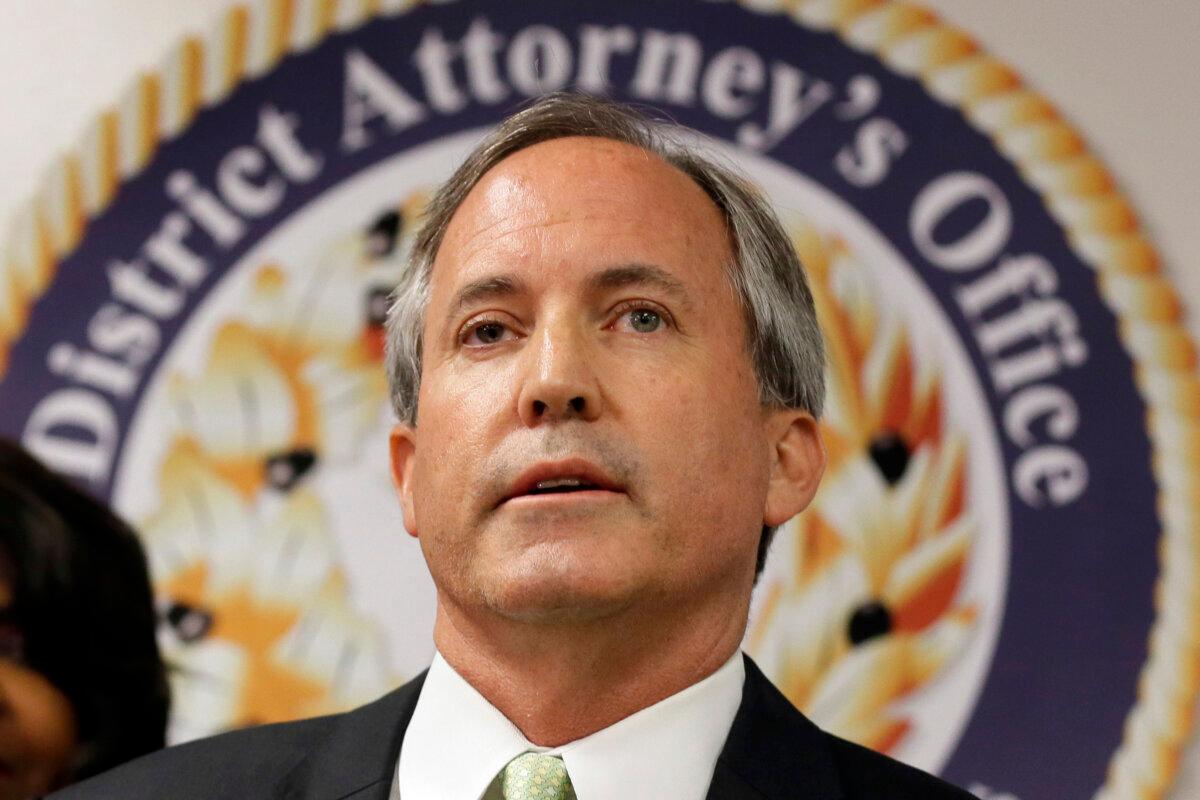 Texas Attorney General Ken Paxton speaks at a news conference in Dallas on June 22, 2017. (Tony Gutierrez/AP Photo)