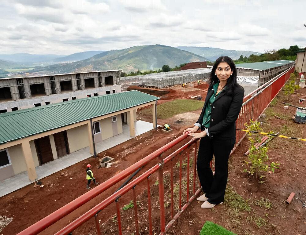 Former British Home Secretary Suella Braverman tours a construction site for newly built homes intended to house migrants deported from the UK, on the outskirts of Kigali, Rwanda, on March 18, 2023. (PA Media)