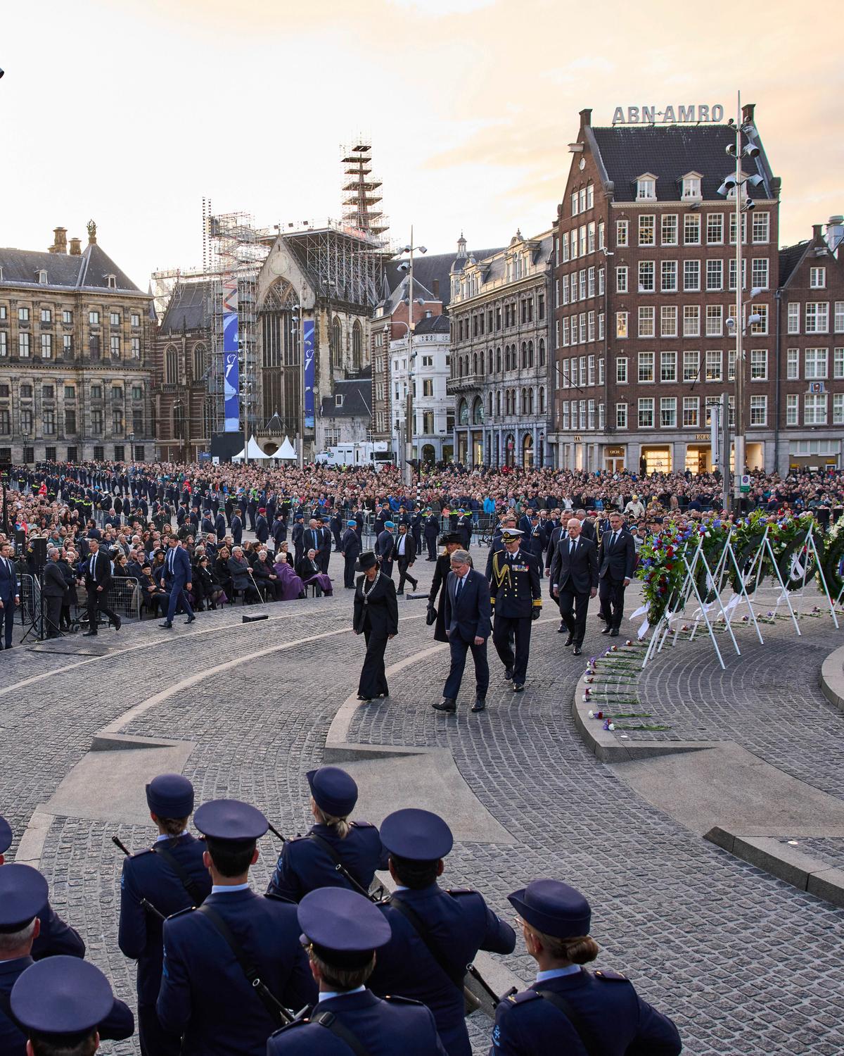 Day in Photos: War Commemoration, Attack on Kyiv, and a Mud Race