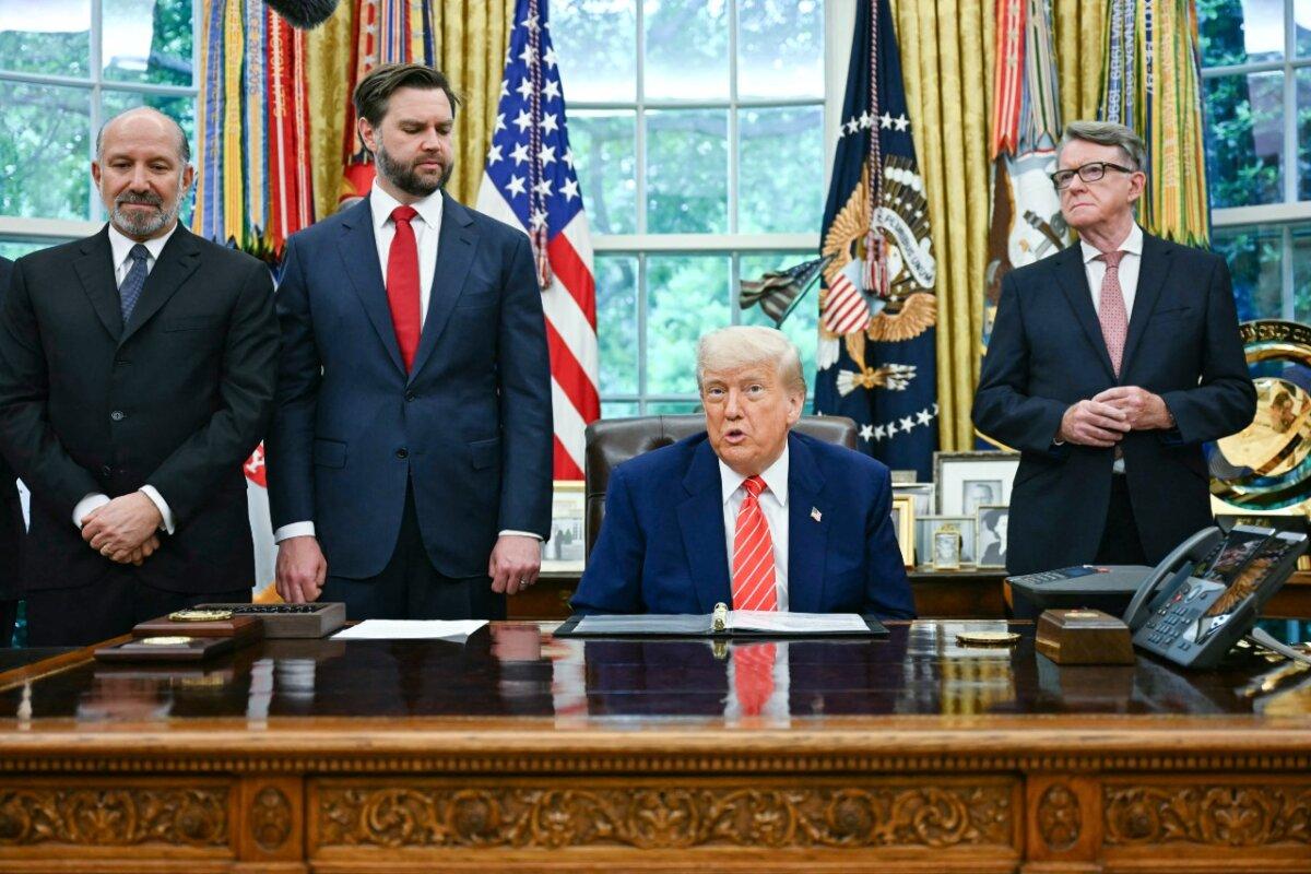 President Donald Trump makes a trade announcement as Secretary of Commerce Howard Lutnick (L), Vice President JD Vance (2nd L), and British ambassador to the United States Peter Mandelson (R) look on in the Oval Office of the White House on May 8, 2025. (Jim Watson/AFP via Getty Images)
