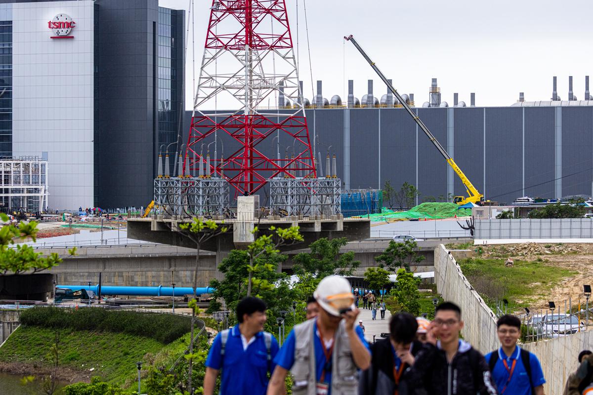 A Taiwan Semiconductor Manufacturing Co. Ltd. (TSMC) building is seen in the background at Hsinchu Science Park in Hsinchu, Taiwan, on April 18, 2025.  (Annabelle Chih/Getty Images)