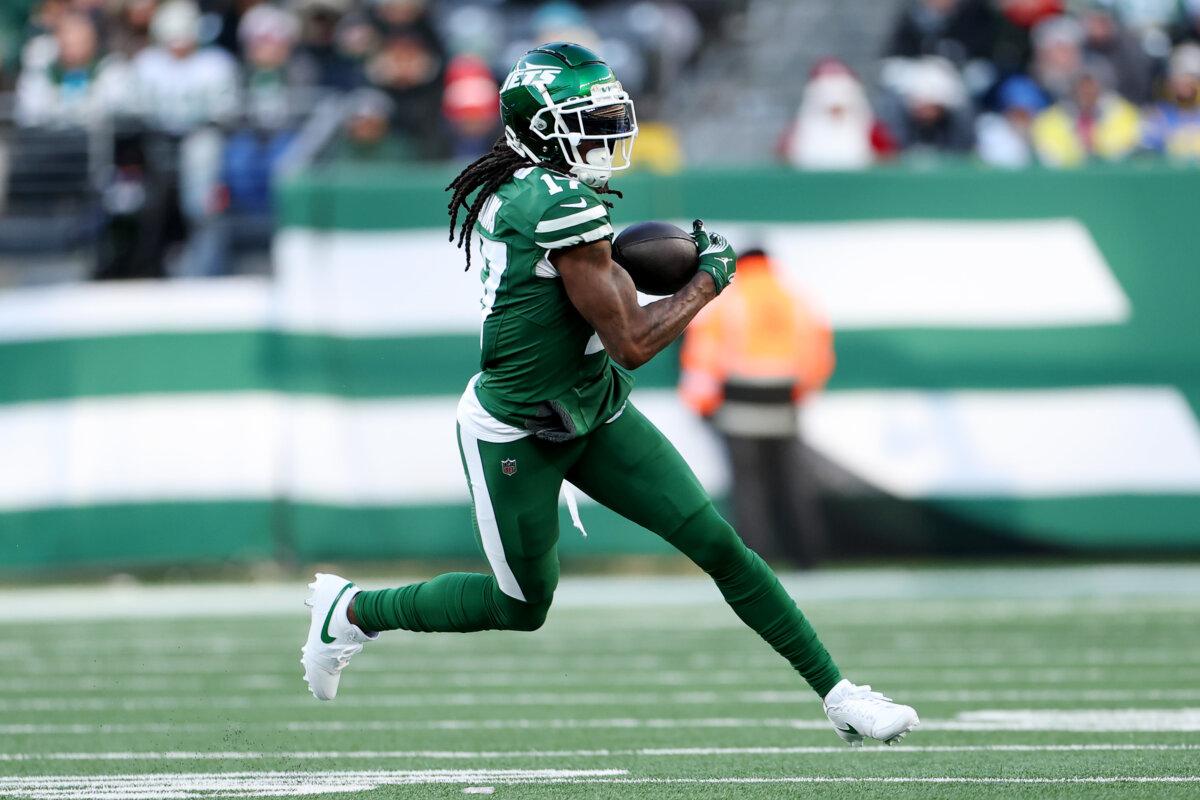 Davante Adams of the New York Jets carries the ball during a game against the Los Angeles Rams at MetLife Stadium in East Rutherford, New Jersey, on Dec. 22, 2024. (Emilee Chinn/Getty Images)