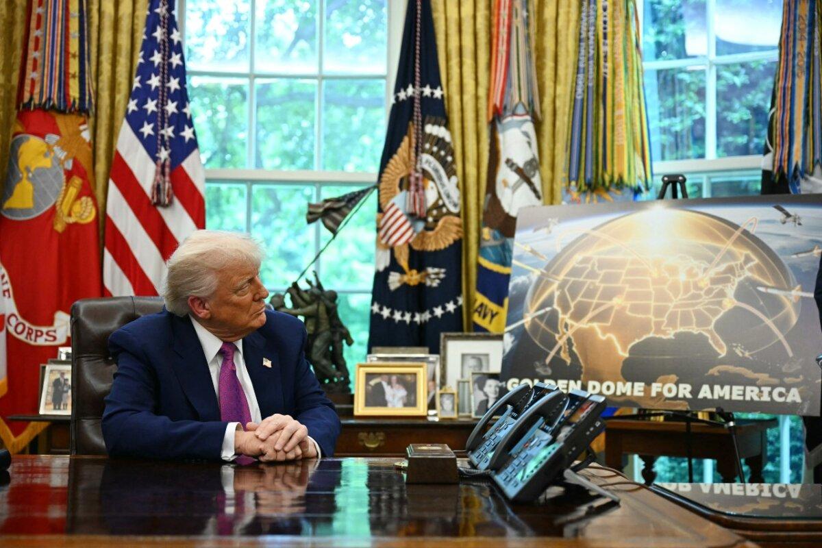 President Donald Trump listens during an announcement about the Golden Dome missile defense shield, in the Oval Office of the White House on May 20, 2025. (Jim Watson/AFP via Getty Images)