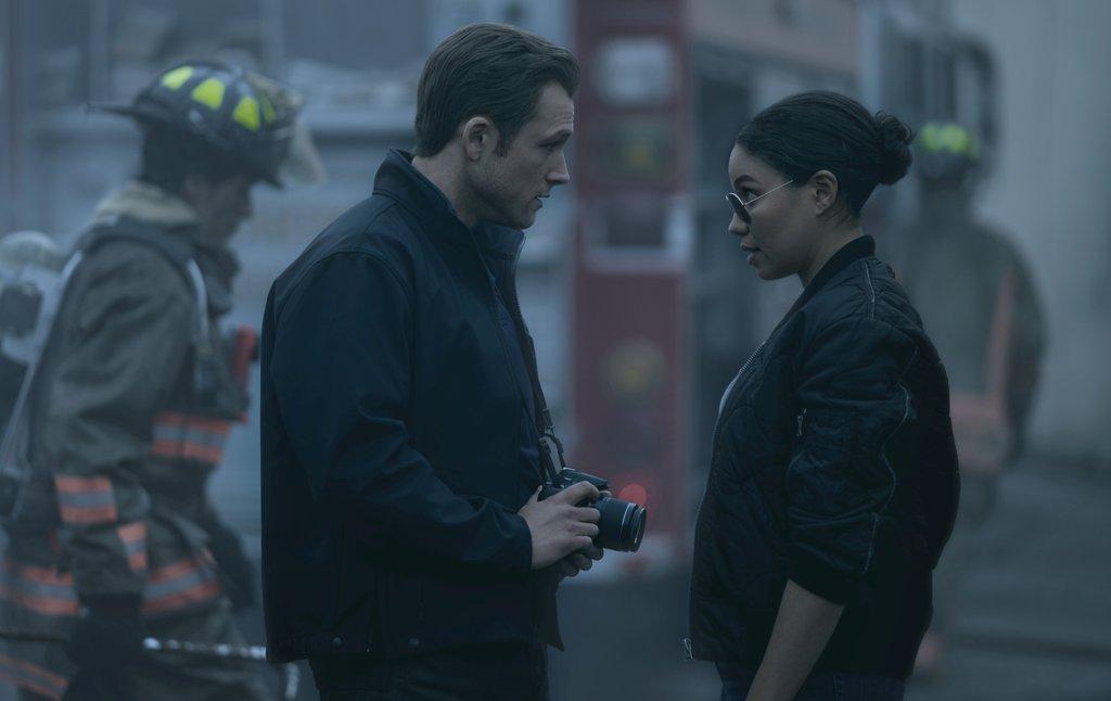 <span style="color: #000000;">Arson investigator (Taron Egerton) and detective (Jurnee Smollett), in "Smoke." (Apple TV+)</span>
