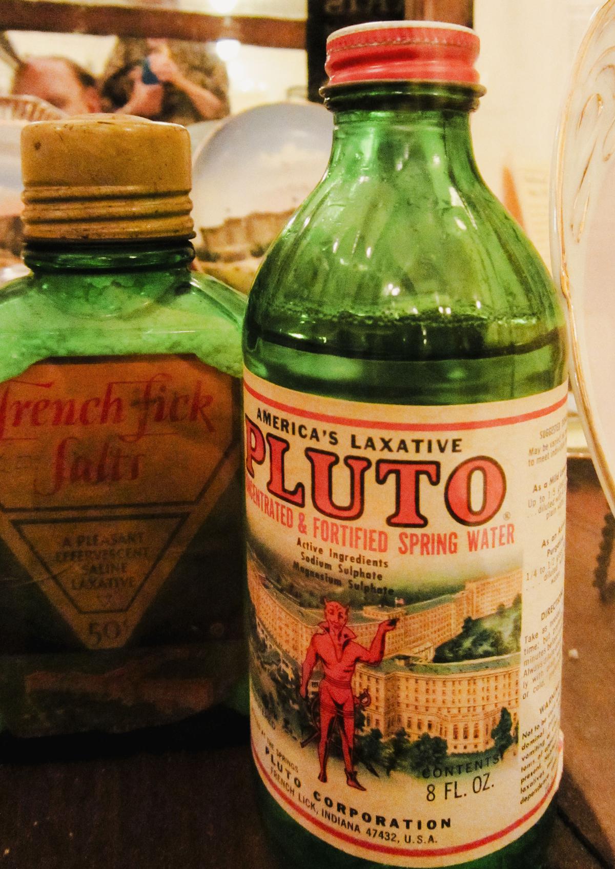Antique bottle of "Pluto Water" from a display of memorabilia and antiques at the West Baden Springs Hotel, French Lick, Indiana. (Geoffrey A. Landis/CC BY SA-3.0)
