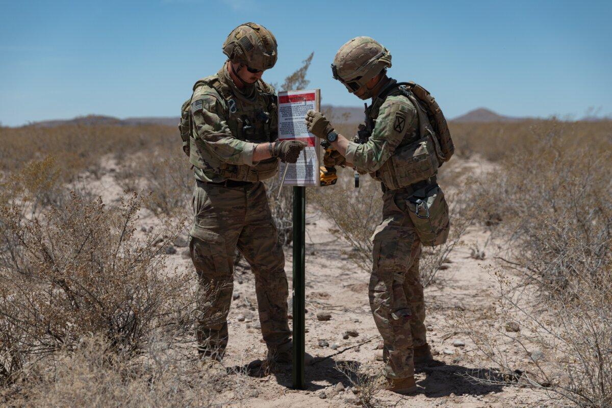 Joint Task Force Southern Border Troops mark the perimeter of the New Mexico National Defense Area, reinforcing a key stretch of the southern border. (U.S. Northern Command)