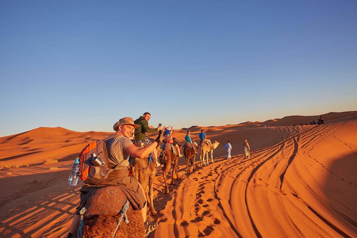 Group tours provide safe opportunities to meet other travelers. (Ryzhkov Oleksandr/Shutterstock)
