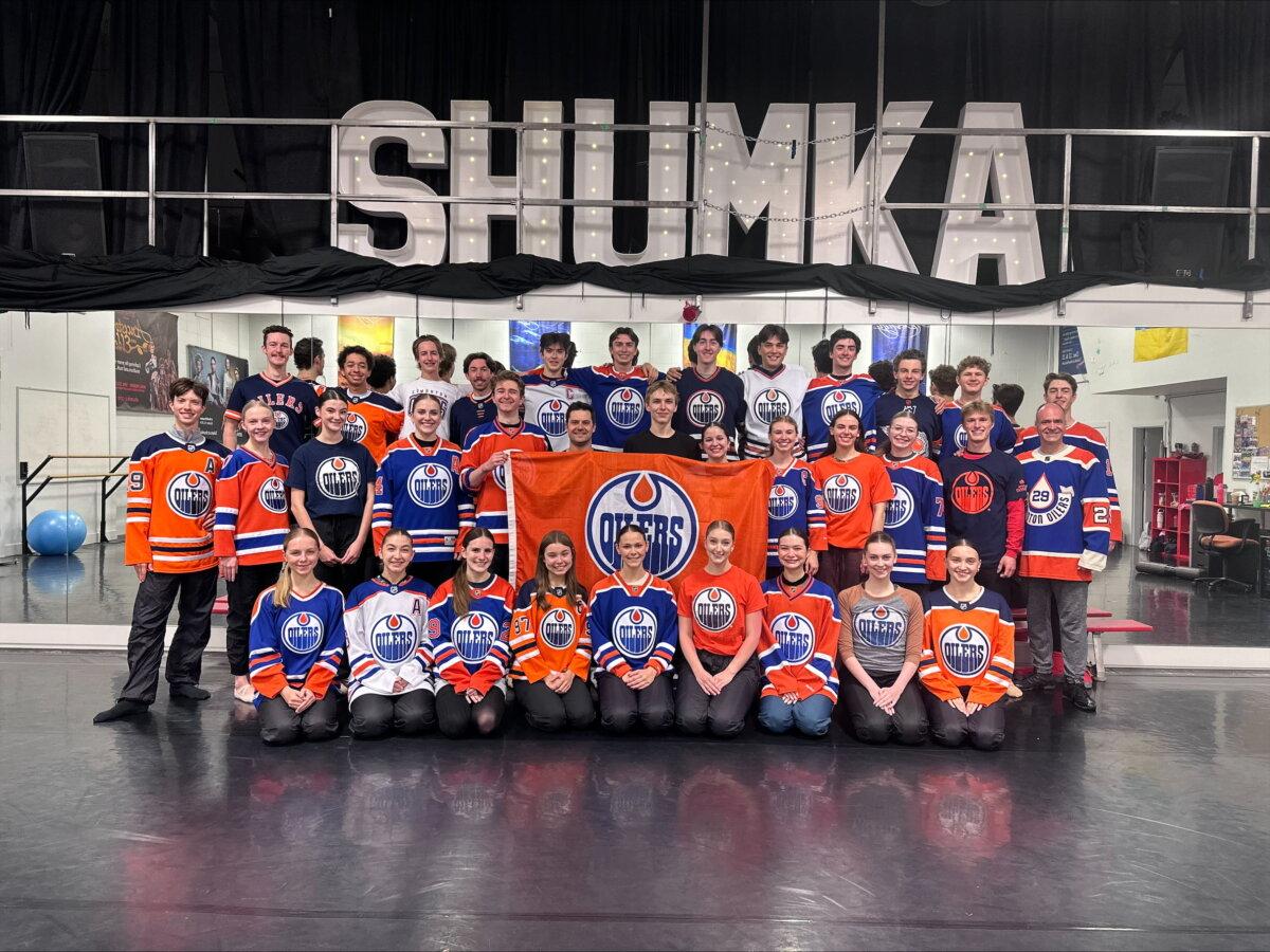 Members of the performing arts group Ukrainian Shumka Dancers wearing Edmonton Oilers shirts. (Courtesy of Ukrainian Shumka Dancers)