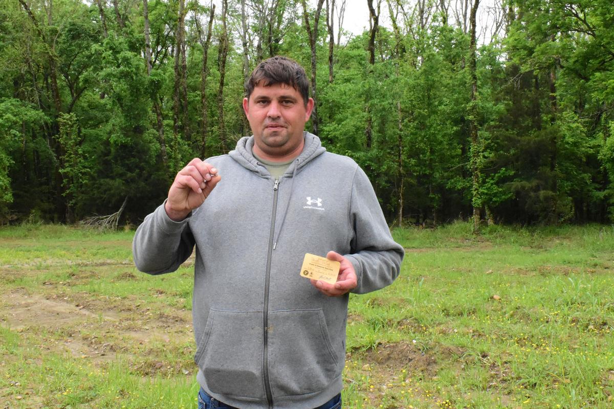 David DeCook holds his diamond and certification of registration. (Courtesy of Crater of Diamonds State Park)