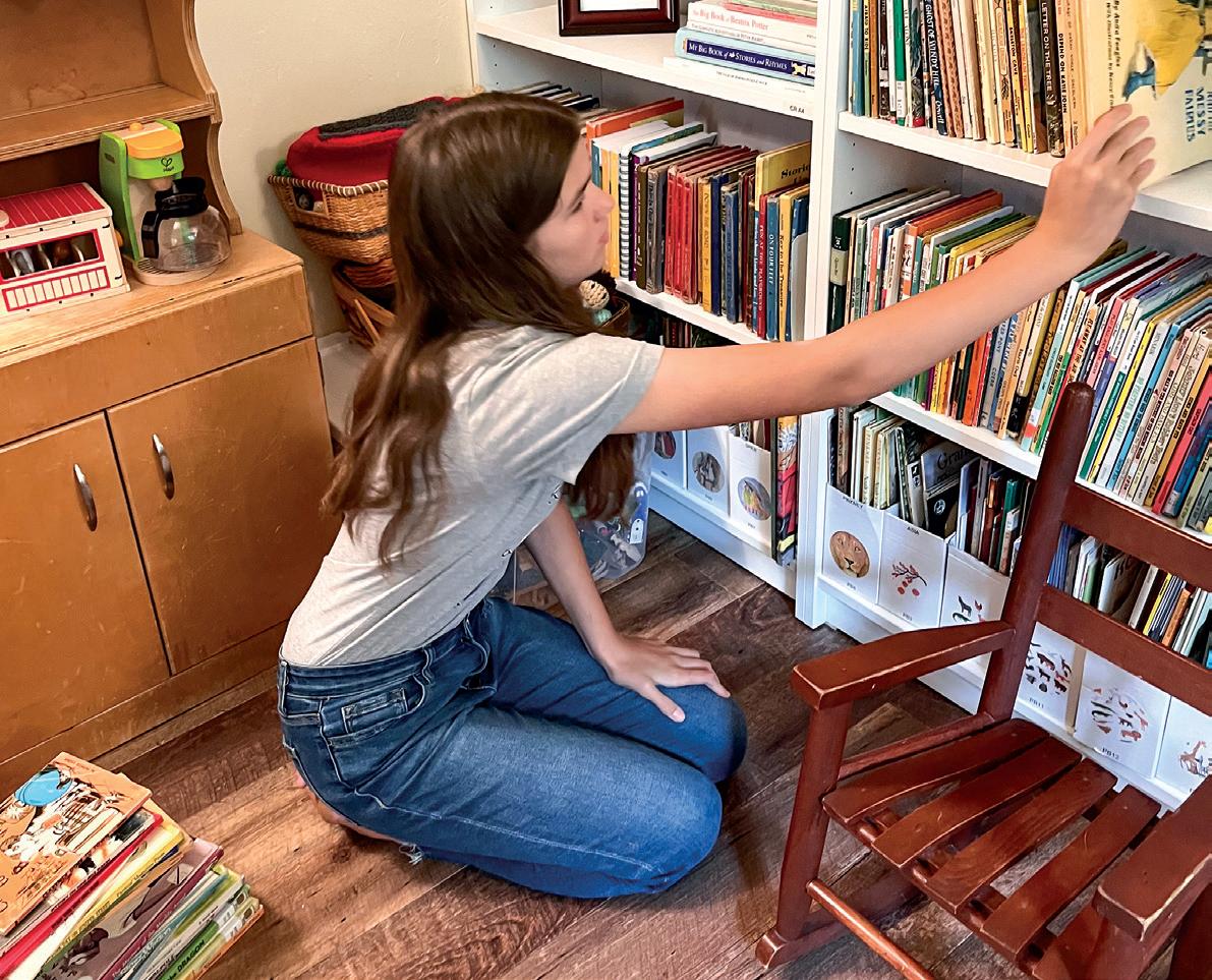 Children of all ages enjoy the books at Plumfield Living Books Library. (Courtesy of Sara Masarik)