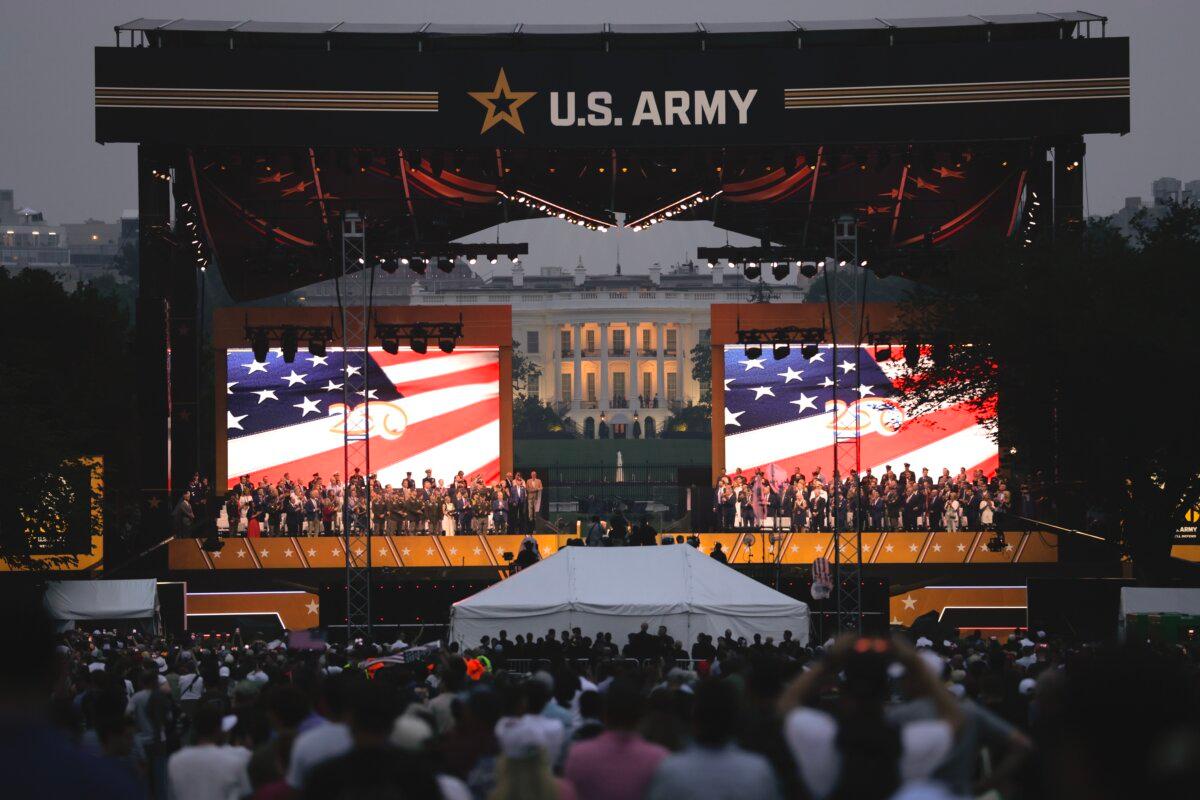 President Donald Trump is given a U.S. flag by a member of the U.S. Army parachute team, also known as the Golden Knights, at the end of the U.S. Army parade in Washington on June 14, 2025. (Anna Moneymaker/Getty Images)