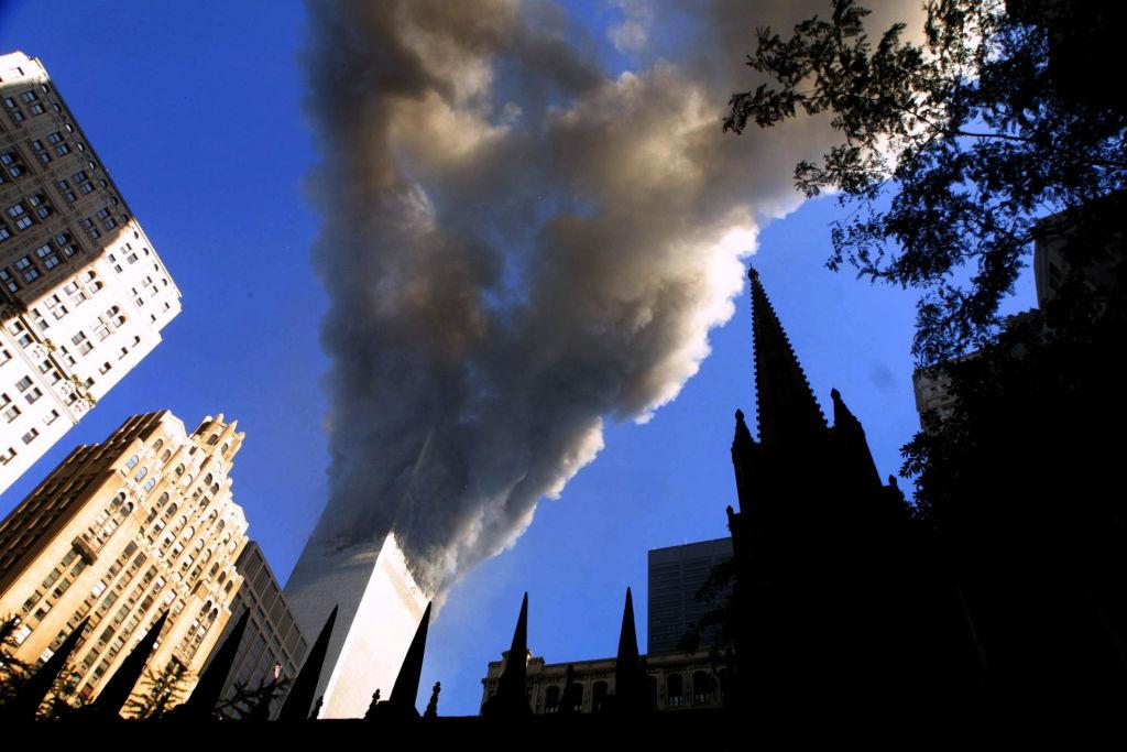 Smoke spews from a tower of the World Trade Center Sept. 11, 2001. (Mario Tama/Getty Images)