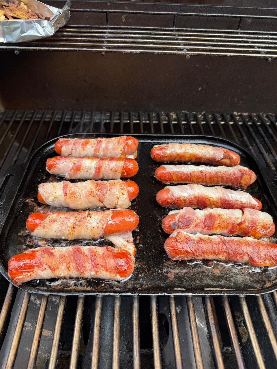 Bacon-wrapped griddled hot dogs are a barbecue upgrade. (JeanMarie Brownson/TCA)