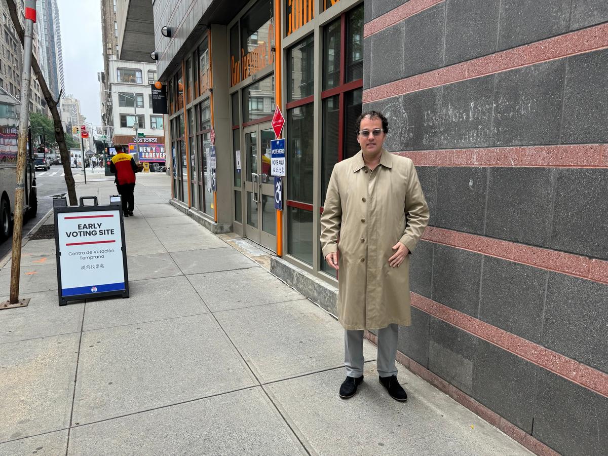 Simon Ruzick, of Chelsea, stands outside a polling station after casting his early vote in the New York Mayoral election's Democratic primary on June 16, 2025. (Arjun Singh/The Epoch Times)