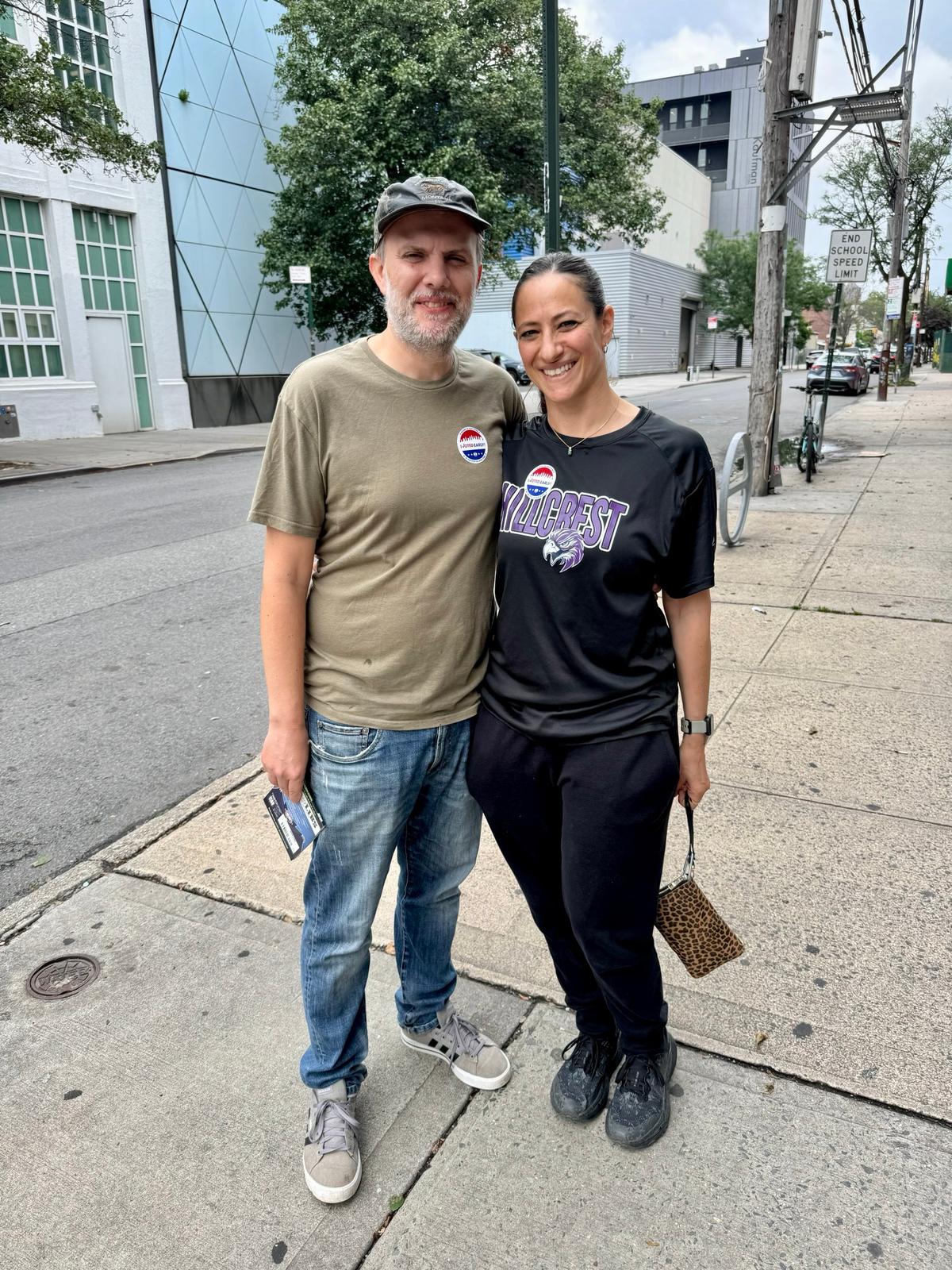 Tyler Berber and Karen Martyr, two teachers, wear "I Voted" stickers after casting their early votes for the New York Mayoral election's Democratic Primary, in Queens, N.Y., on June 16, 2025. (Arjun Singh/The Epoch Times)