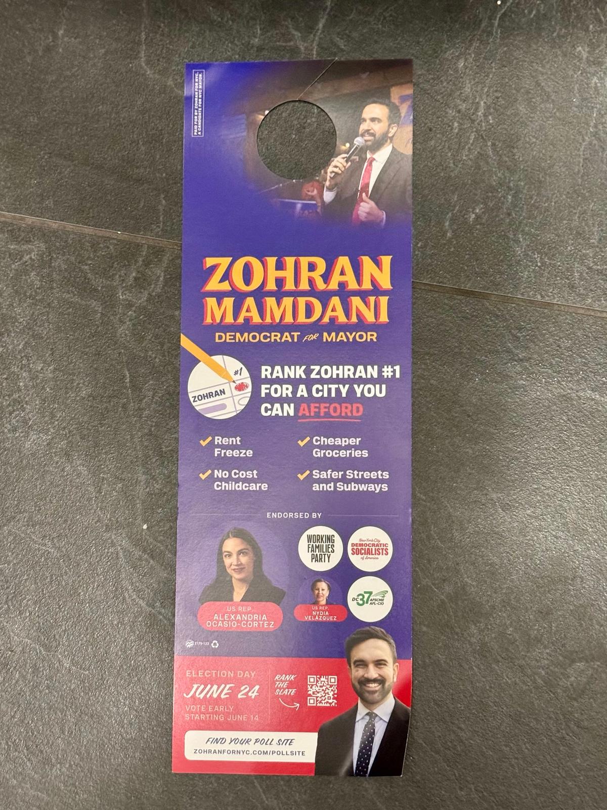 A campaign flyer in support of Zohran Mamdani in the foyer of an apartment building in Greenwich Village, Manhattan, N.Y., on June 18, 2025. (Arjun Singh/The Epoch Times)