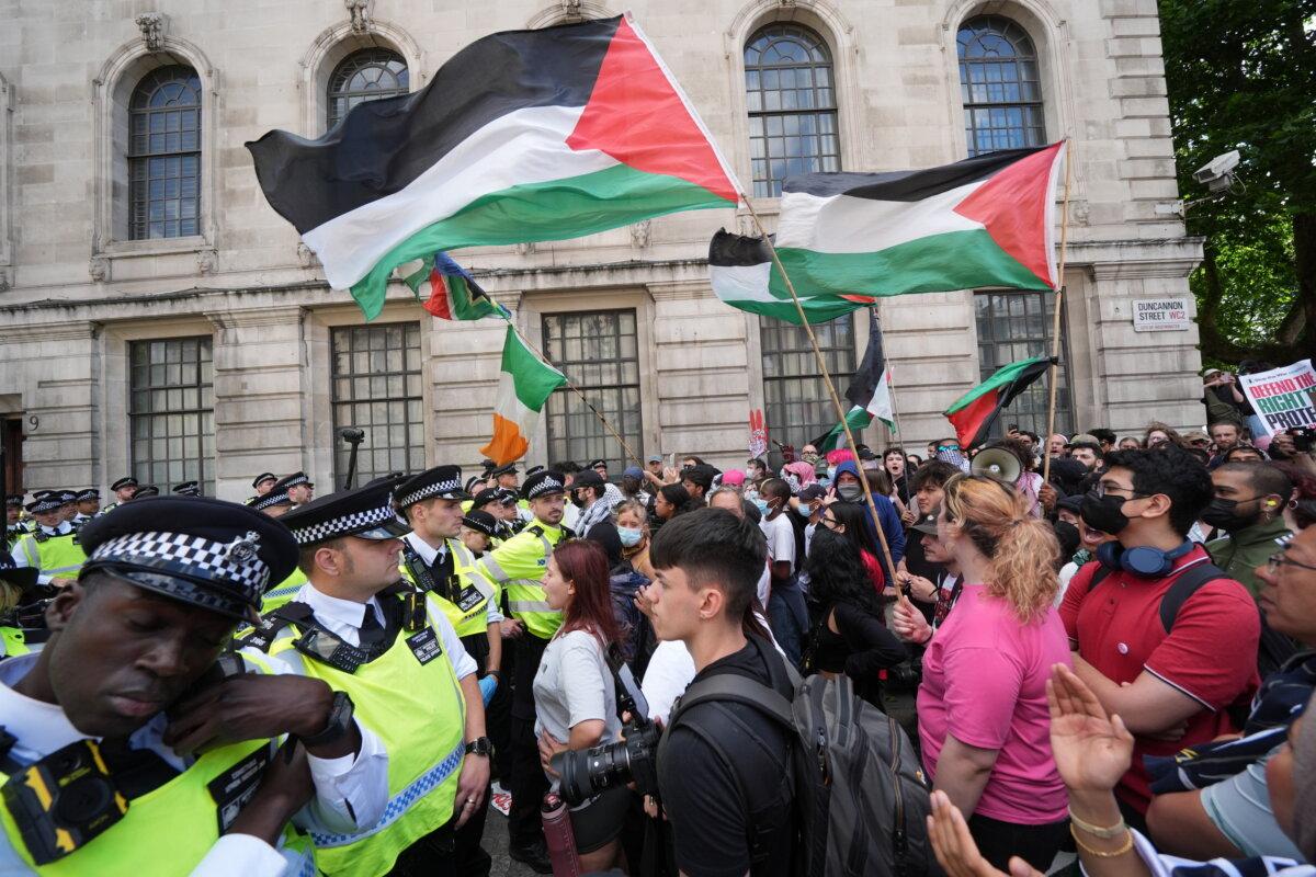 Police block the way of people taking part in a demonstration in central London in support of Palestine Action on June 23, 2025. (Lucy North/PA Wire)