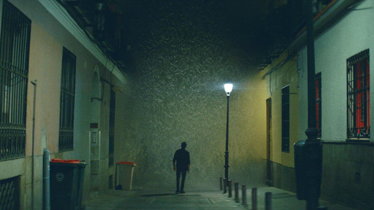 Nicolas (Henry Golding) wanders outside, in a scene from "Daniela Forever." (Mediacrest Entertainment)