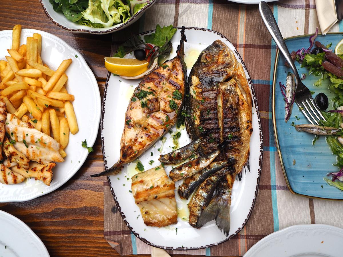 Dubrovnik’s coastal location makes it a prime destination for fresh Adriatic seafood, often served grilled with local olive oil and herbs. (Flycatcher/Shutterstock)