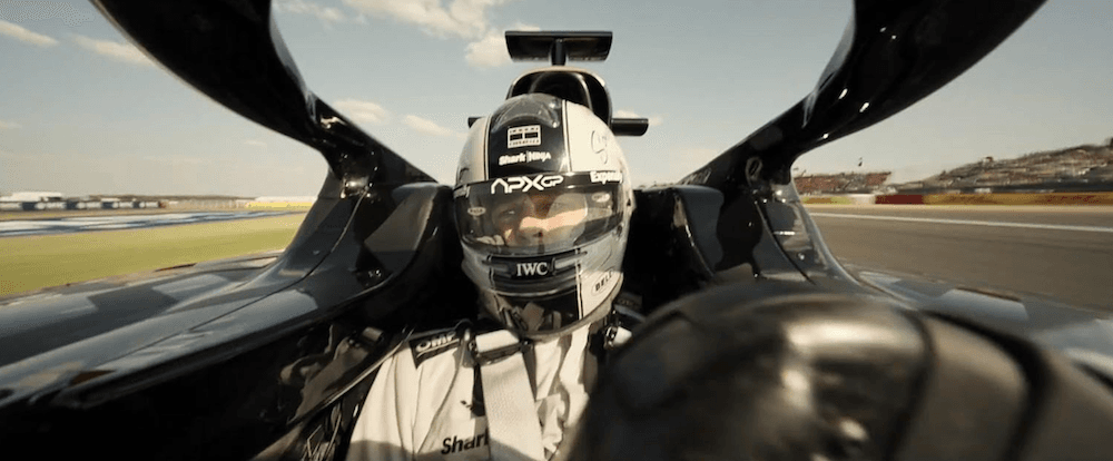 Sonny Hayes (Brad Pitt) hell bent for leather in his Formula One racing car, in "F1: The Movie." (Warner Bros. Pictures)