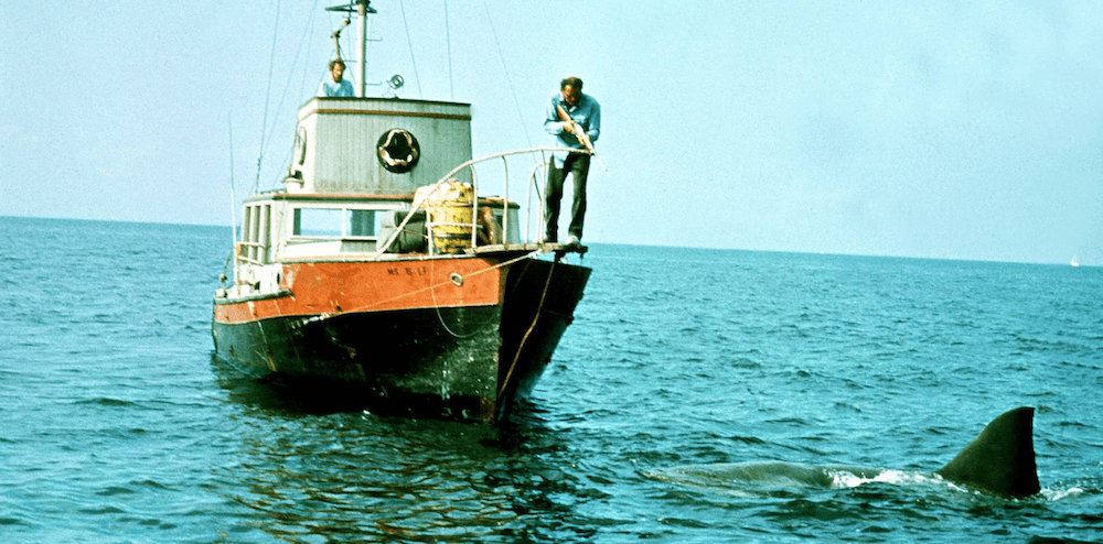 Quint (Robert Shaw) fires on the beast, in "Jaws." (Universal Pictures)