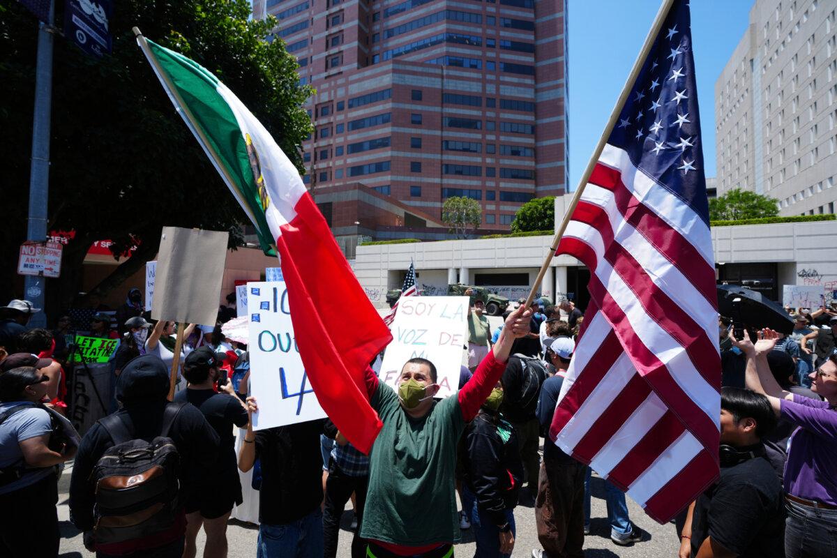 Protesters rally against immigration operations in Los Angeles on June 10, 2025. (Damian Dovarganes/AP Photo)