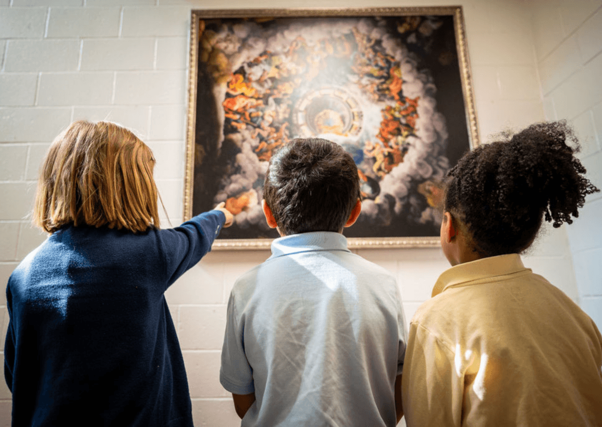 Students at the Alberta Classical Academy look at a replica of a work by Italian Renaissance artist and architect Giulio Romano. (Alberta Classical Academy)