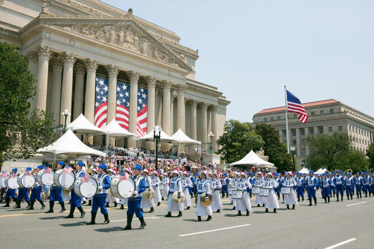 New York Tian Guo Marching Band participates in the Independence Day parade in Washington on July 4, 2025. (Lisa Fan/The Epoch Times)