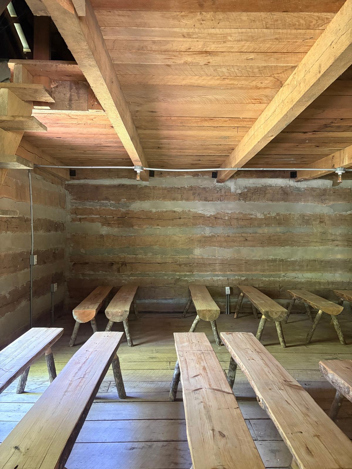 Students in the Liberty Hill School sat on benches in this rough-hewn cabin to learn reading, writing, and arithmetic. (Deena Bouknight)