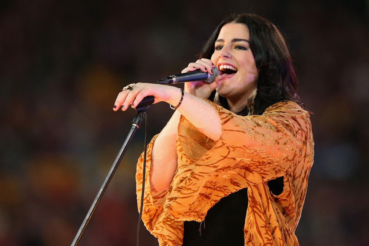 'The Voice' winner Karise Eden performs during game three of the 2012 State of Origin series between the Queensland Maroons and the New South Wales Blues at Suncorp Stadium in Brisbane, Australia on July 4, 2012. (Cameron Spencer/Getty Images)