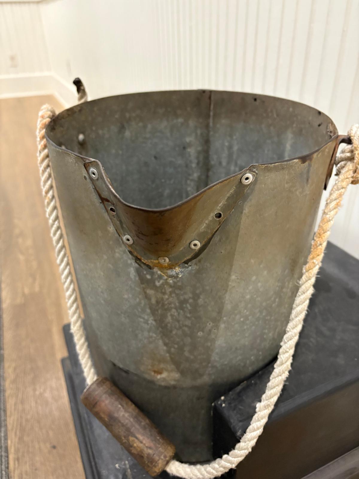 Visitors can pick up the bucket that the lighthouse keepers used to carry to the top of the lighthouse. (Deena Bouknight)