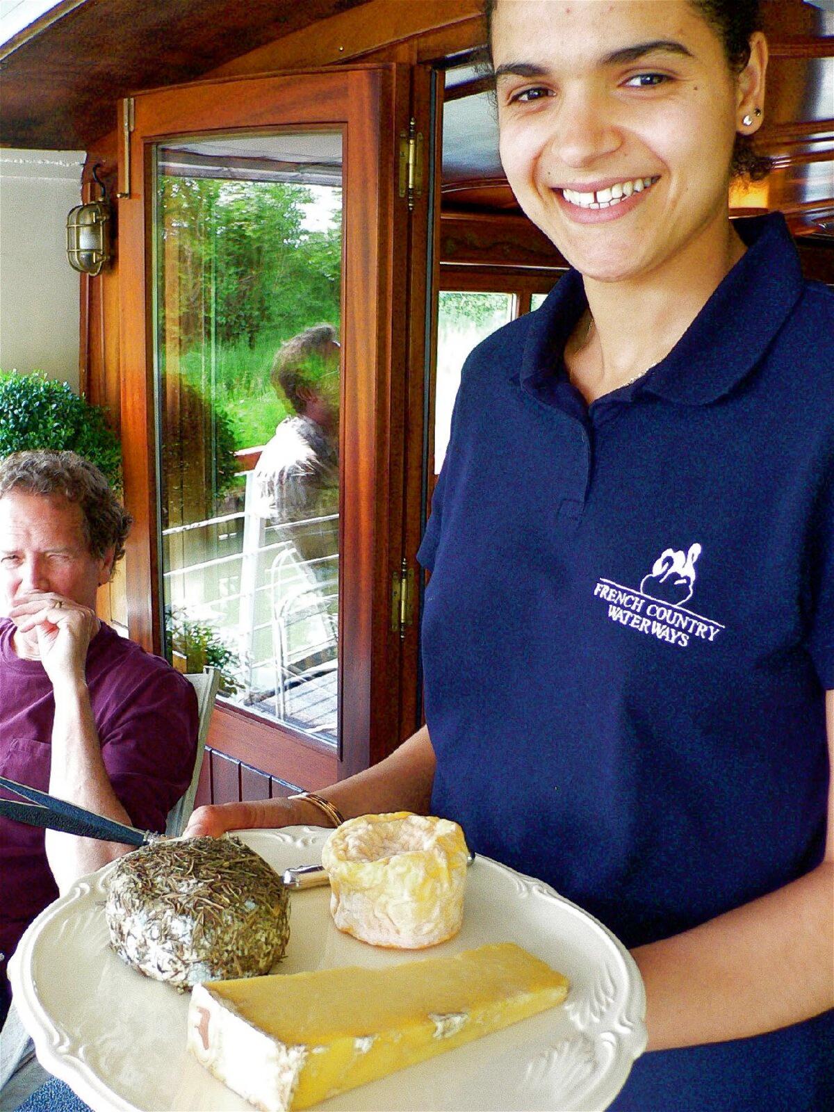 Dinner on the Nenuphar during a voyage through French canals always includes wine and cheese. (French Country Waterways)