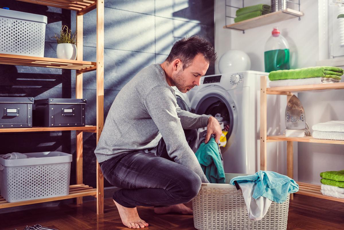 A daily load of laundry prevents buildup and keeps the task from becoming overwhelming. (Zivica Kerkez/Shutterstock)