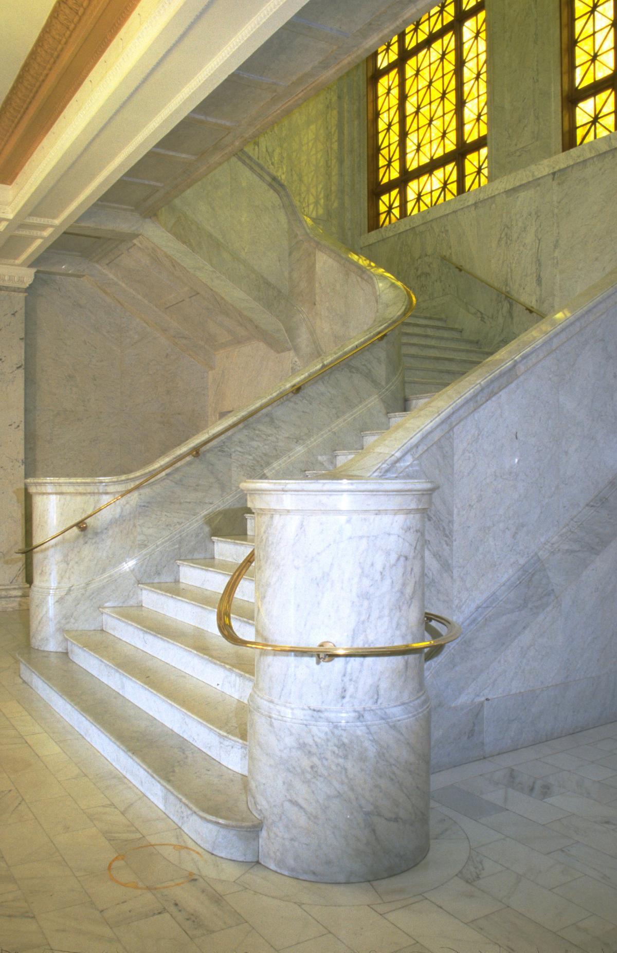 Italian Carrara marble dominates City Hall’s stunning, sweeping staircase with shiny brass railing. The paned window in the stairwell’s landing is made of yellow stained glass outlined with a geometric crisscross design. The stairwell leads from the City Hall foyer on the second floor to provide access to the interior council chamber. (City of Ventura)