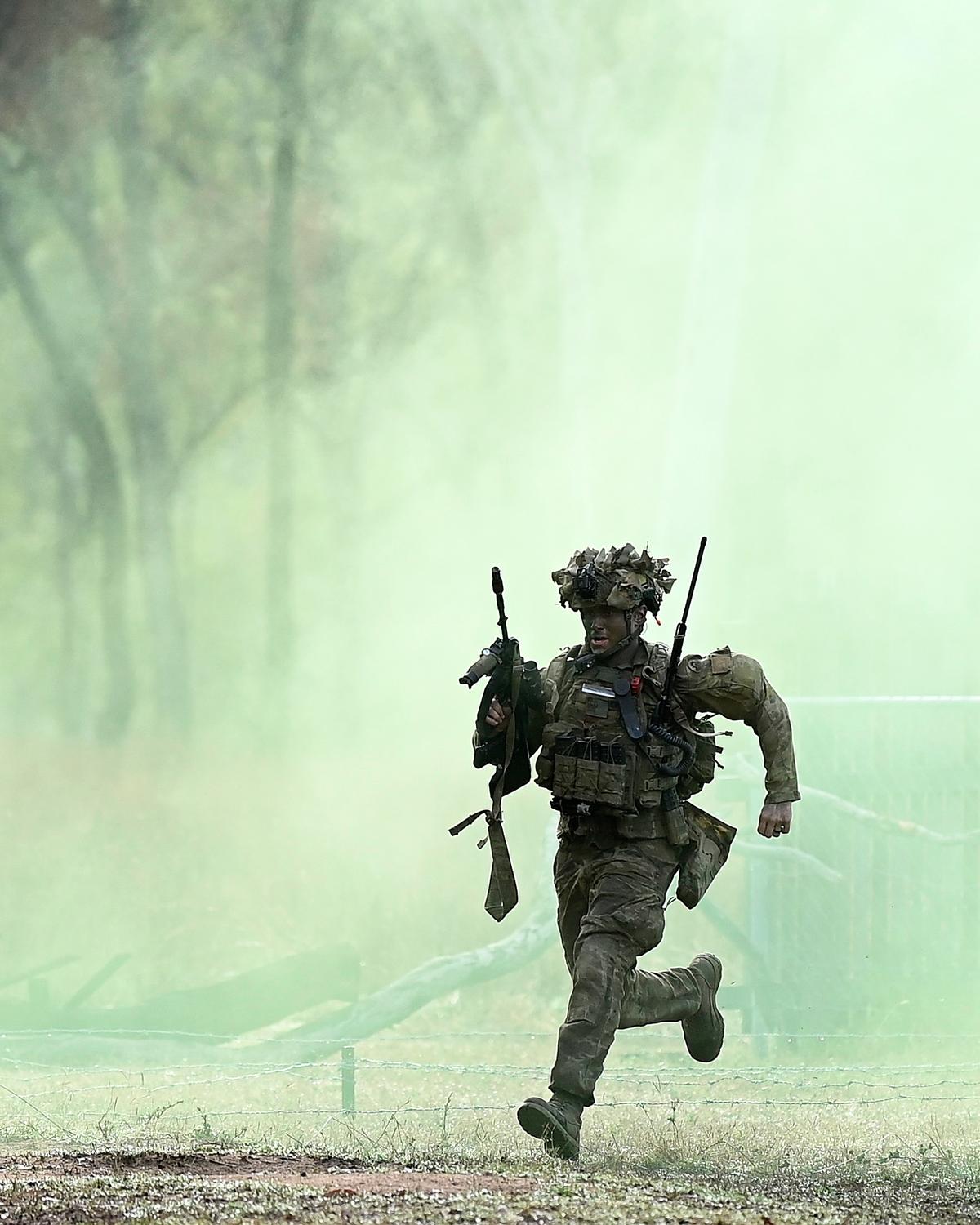 Day in Photos: Military Exercise in Australia, Forest Fire in Cyprus, and Marble Cave