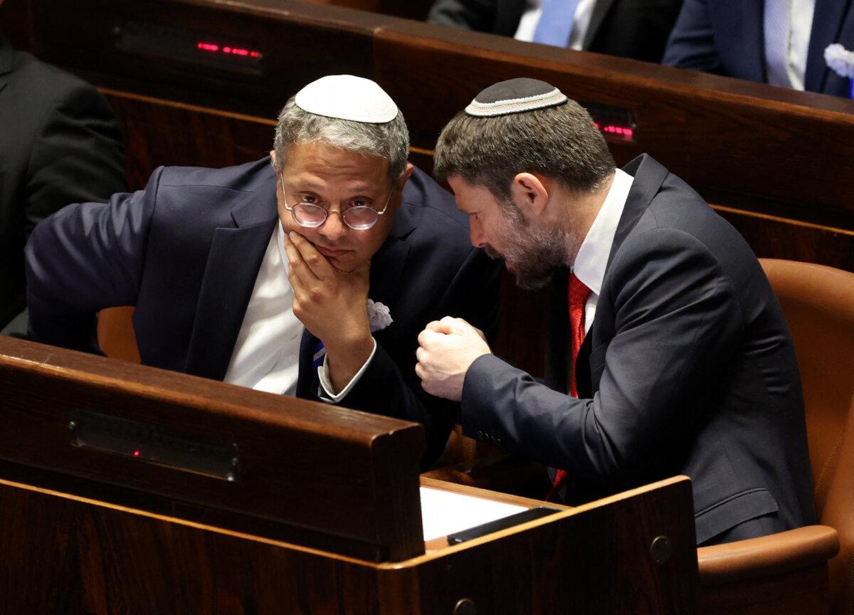 Israeli Knesset member Itamar Ben Gvir (L) and Bezalel Smotrich (R) chat at the Knesset in Jerusalem on Nov. 15, 2022. (Abir Sultan/AFP via Getty Images)