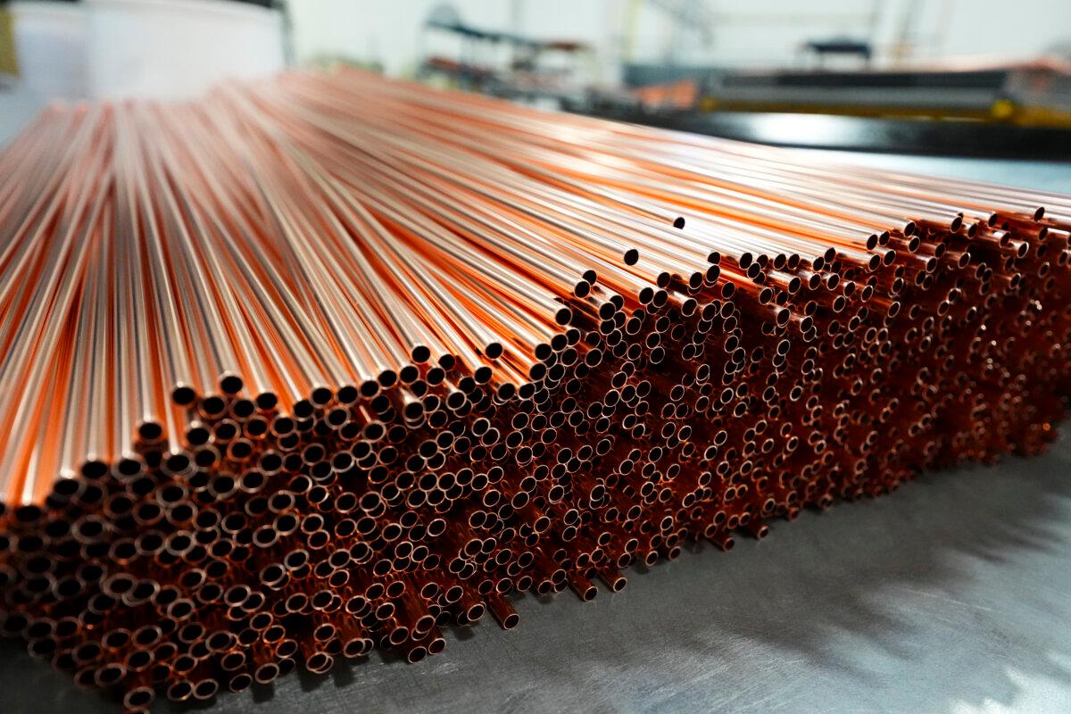 Sections of copper tubing are pictured at Cancoil, manufacturer of commercial refrigeration products, during a news conference in Kingston, Canada, on April 3, 2025. (The Canadian Press/Sean Kilpatrick)