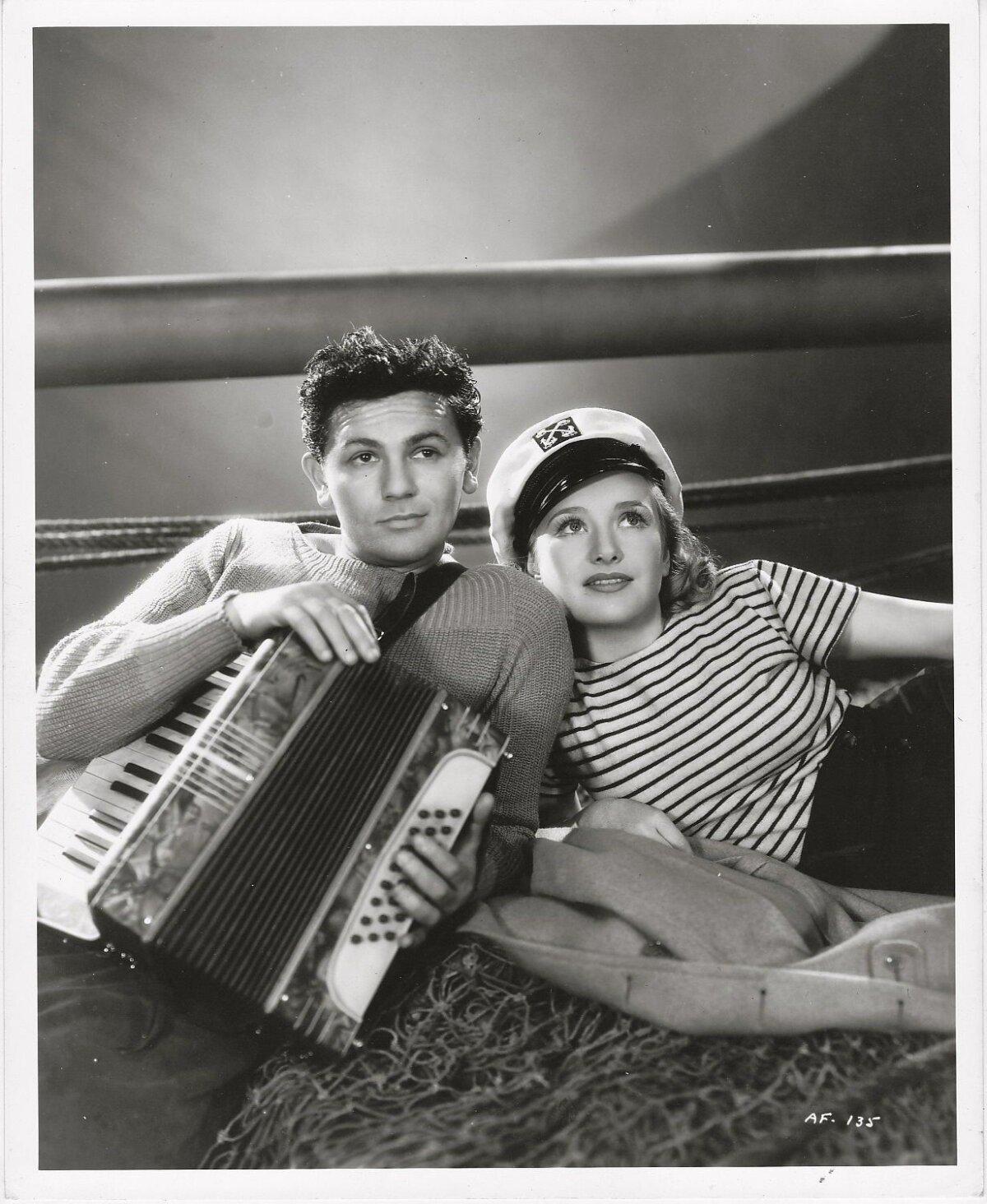Gabriel Lopez (John Garfield) and Buff (Priscilla Lane), in "Daughters Courageous." (Warner Bros.)