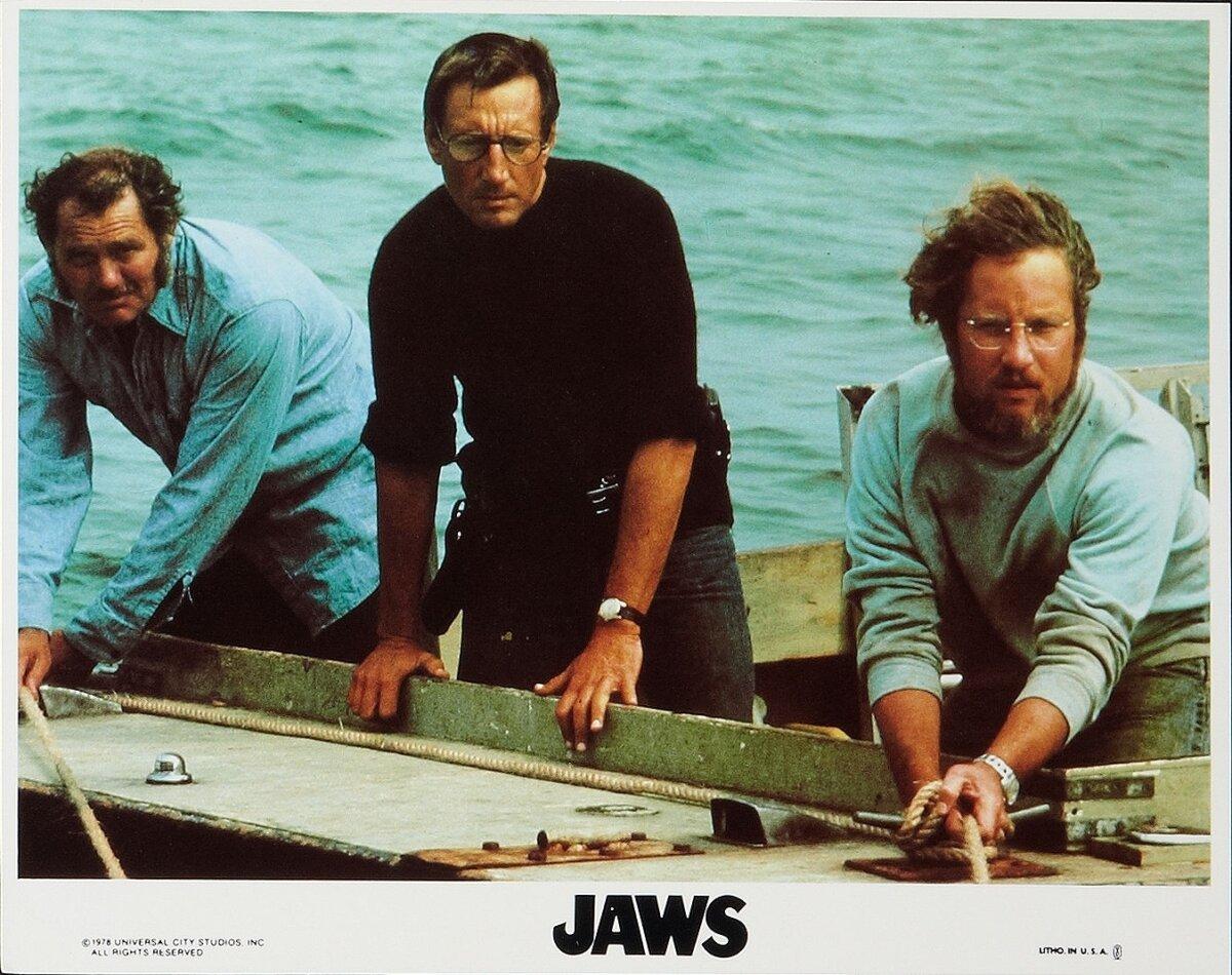 (L–R) Quint (Robert Shaw), Brody (Roy Scheider), and Hooper (Richard Dreyfuss), in “Jaws.” (Universal Studios/MovieStillsDB)