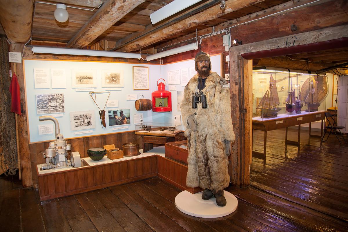 A wax statue of a whaler stands at the Polar Museum. (photoeu/Shutterstock)