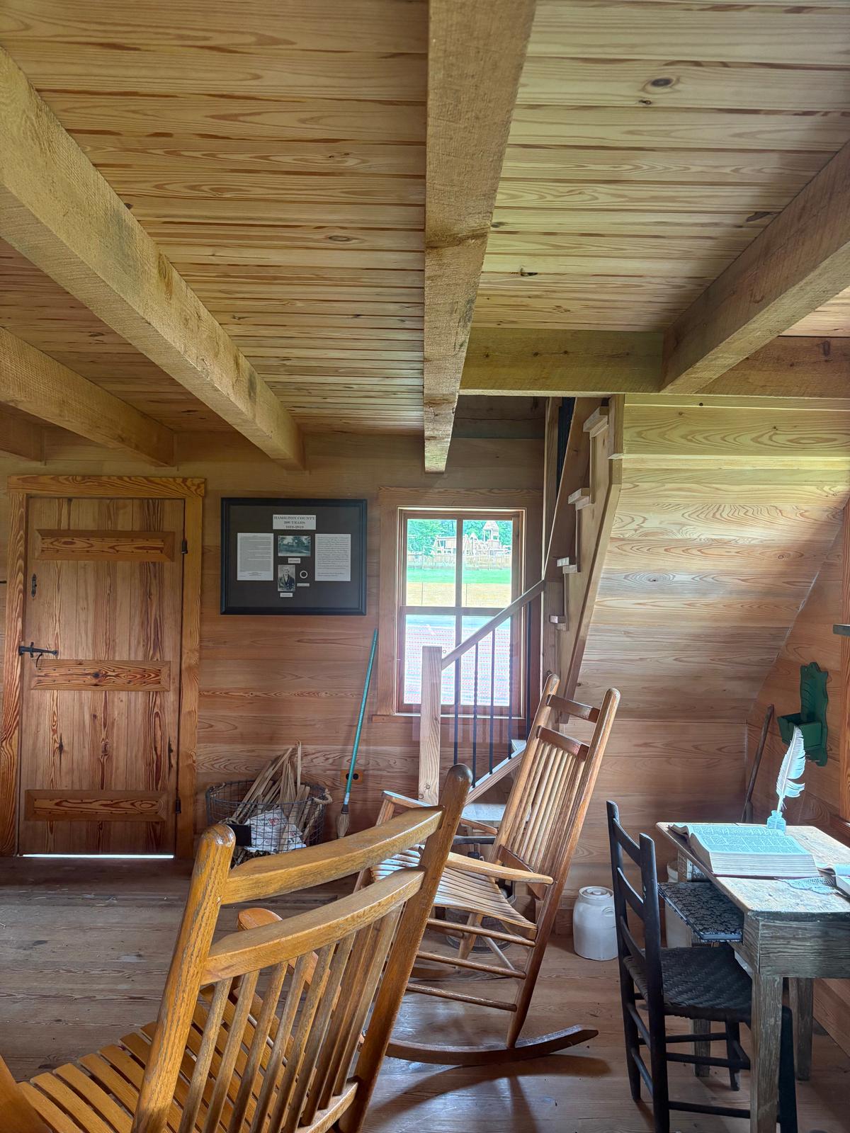 Young craftsmen replicated the wooden beams and finishing in the interior of Poe's Tavern. (Deena Bouknight)